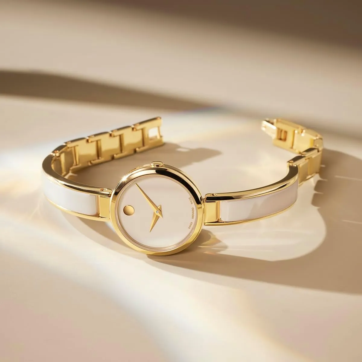 ATM Water Resistance - Luxury Fashion Timepiece for Her portraiture uproot methane particular - 24mm Movado Moda Women's Watch - Swiss Quartz 2H Movement, Plated Stainless Steel, Adjustable Bangle - 3 